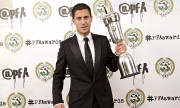 Eden Hazard holding the PFA Player of the Year 2014/15 trophy